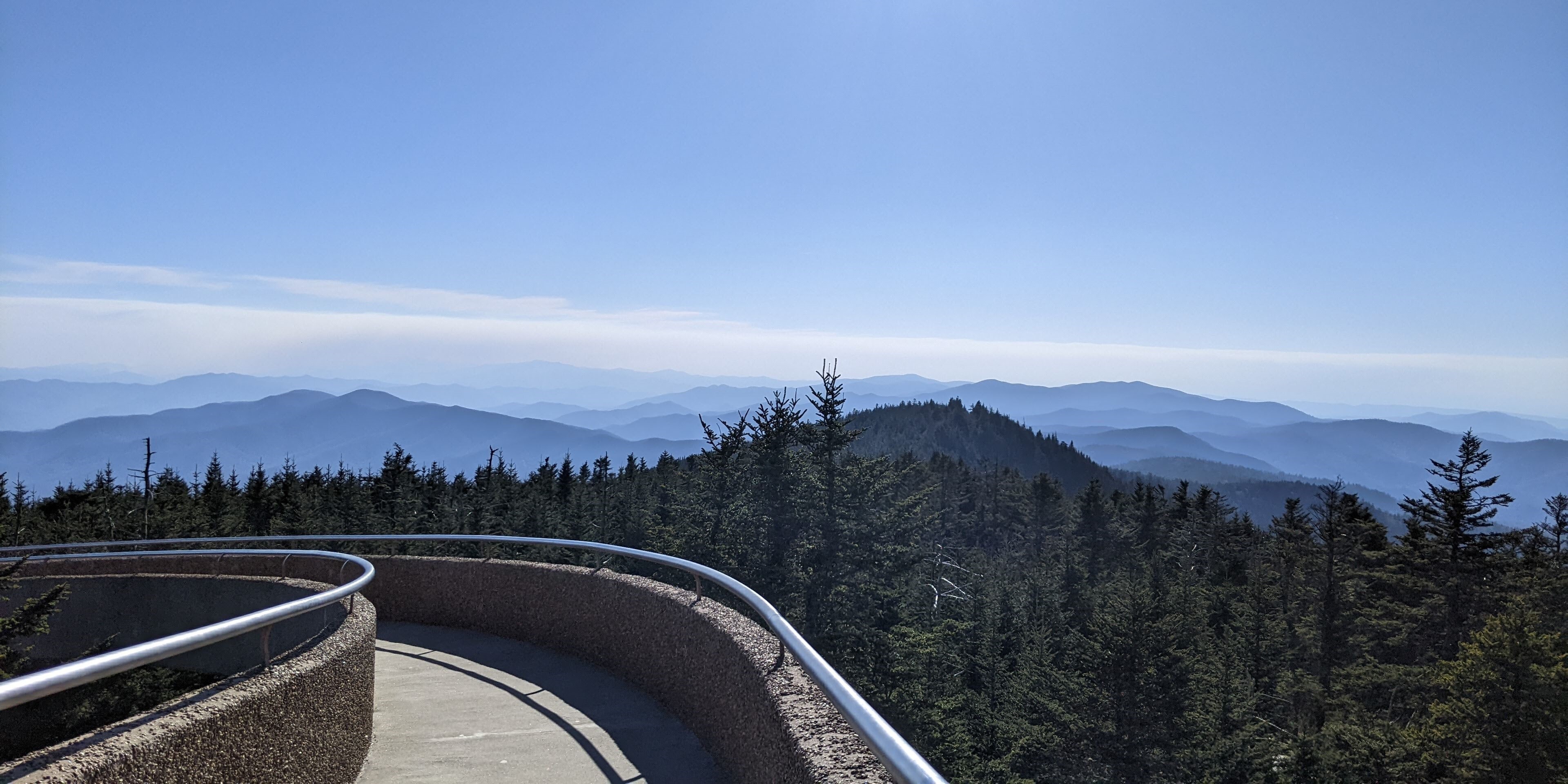 Distant mountain ridges viewed from the walkway to the Kuwohi observation tower