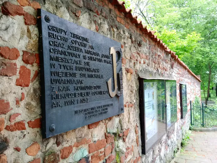 The museum plaque on the older masonry at Archaeological Museum, Kraków