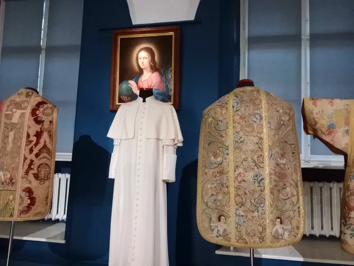 Religious figures in a display case at Archdiocesan Museum, Kraków