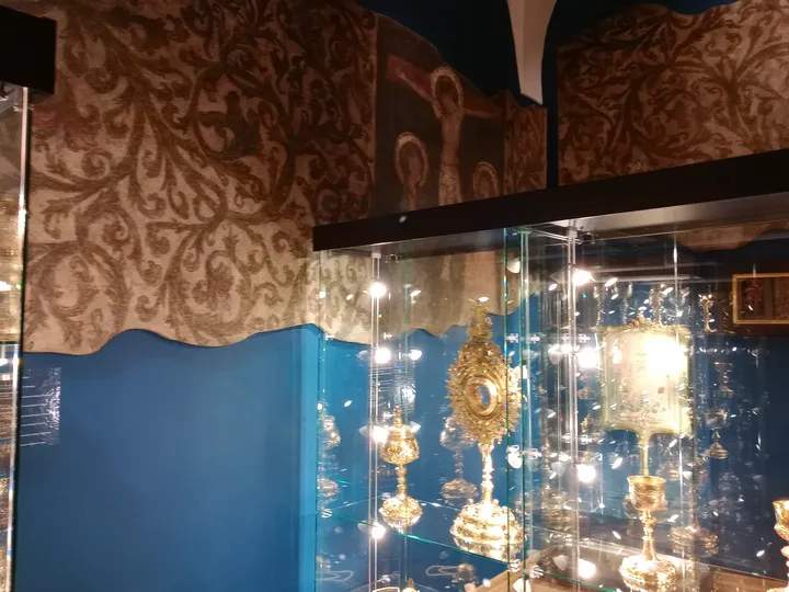 Objects in a glass display case at Archdiocesan Museum, Kraków