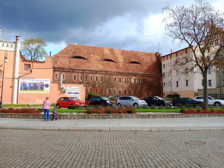 The church complex across the square at Assumption Church, Żagań