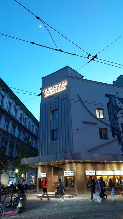 The theatre entrance beneath tram wires at Bagatela Theatre