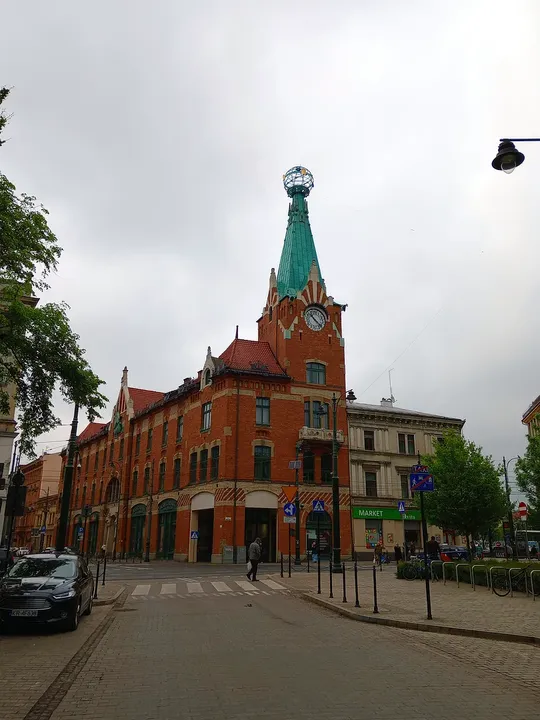 Corner building and pointed green turret at Basztowa Street