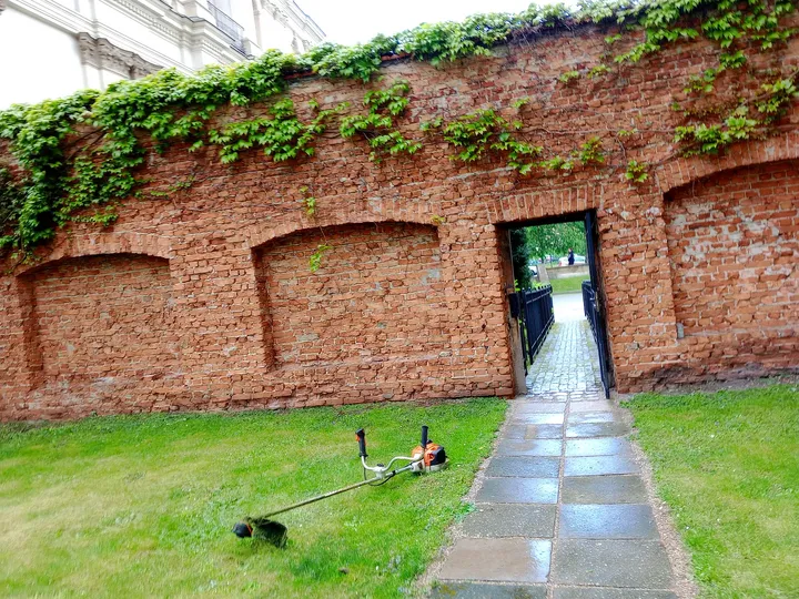 A door in the brick garden wall at Bernardine monastery garden
