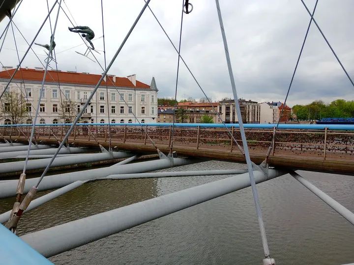 Footbridge and sculpture display over the water at Between Water and Sky sculptures