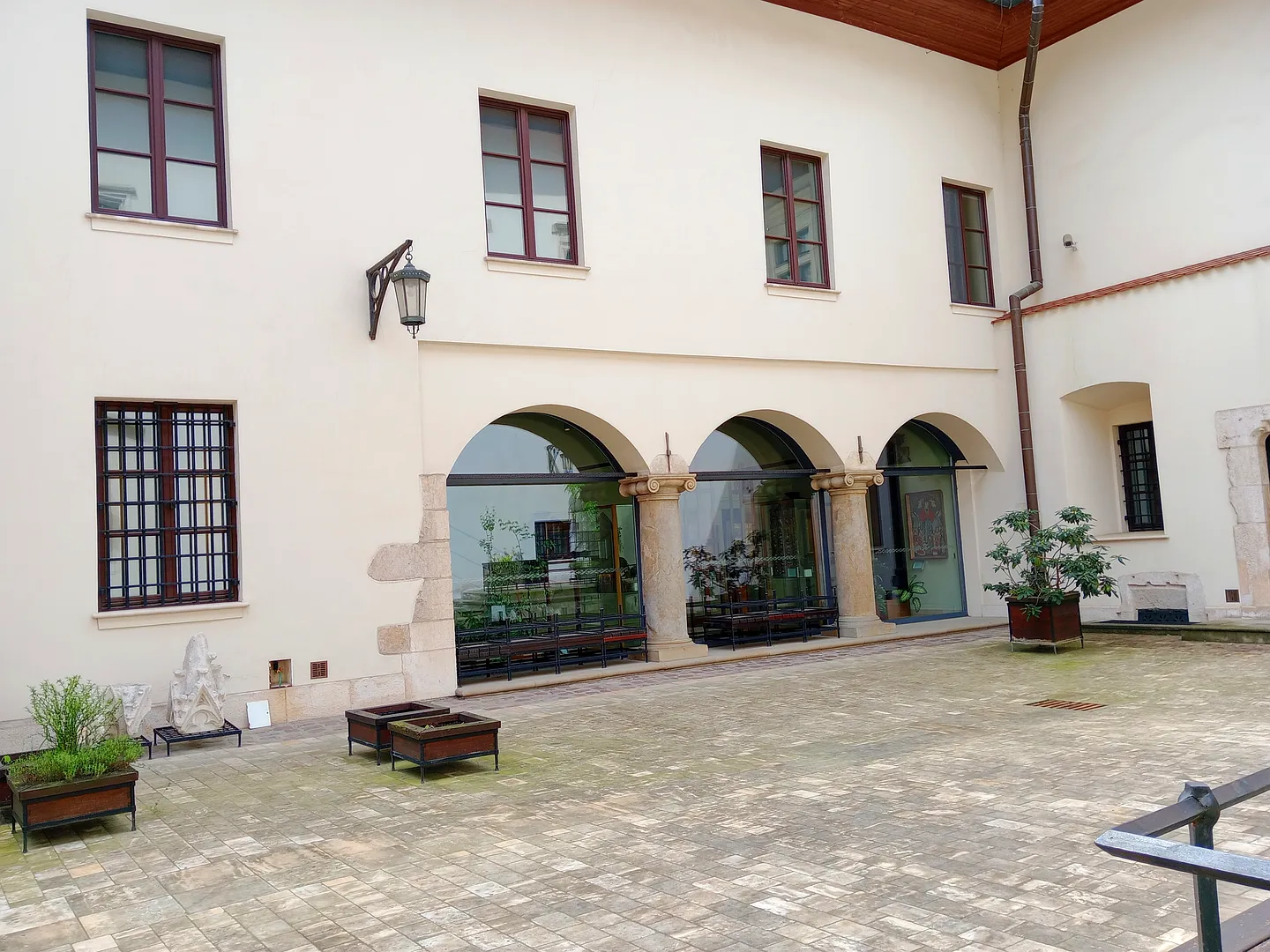 The courtyard with its arcaded edge at Bishop Erazm Ciołek Palace