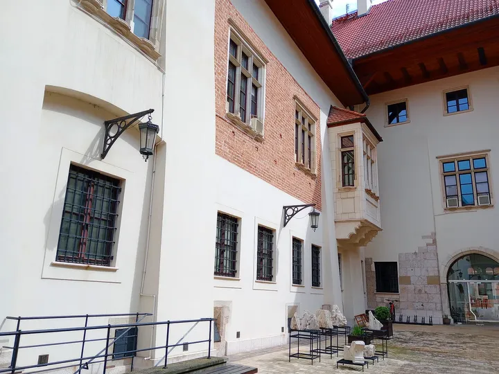 A balcony overlooking the courtyard at Bishop Erazm Ciołek Palace