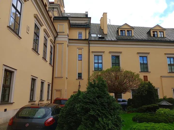 Long pale courtyard wall at Bishops’ Palace, Kraków