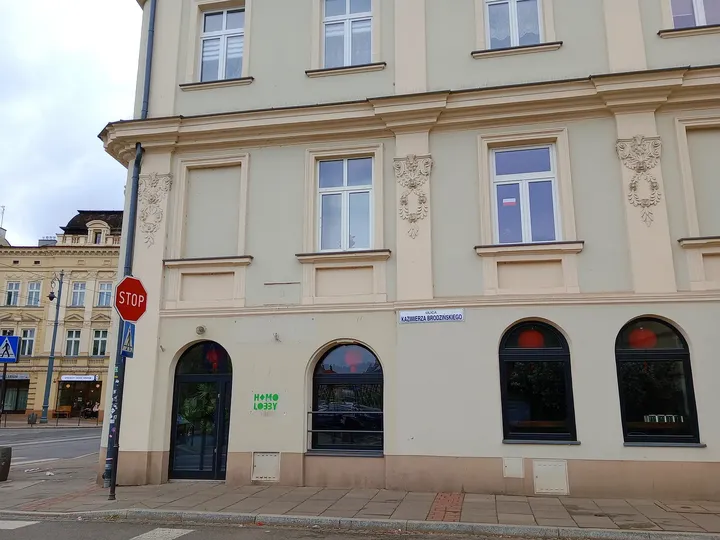 The pale façade above the pavement at Brodzińskiego Street