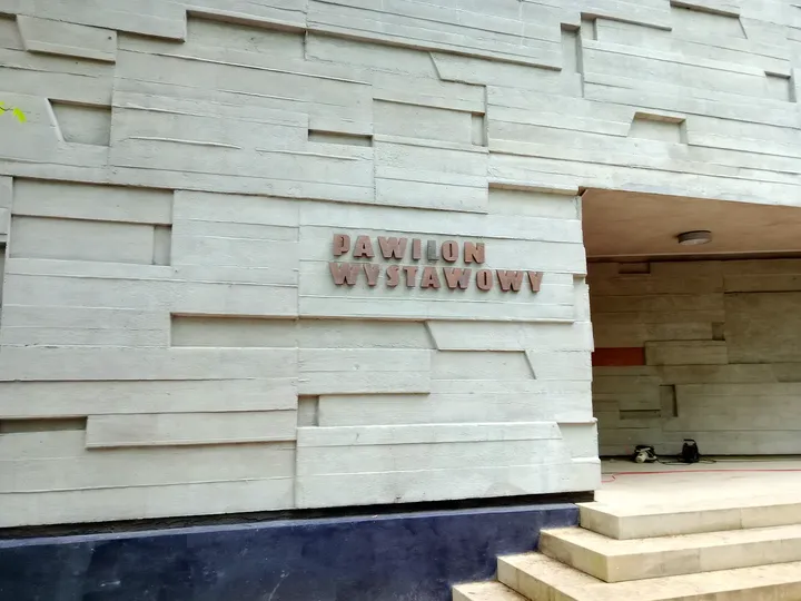 Gallery name beside the concrete entrance at Bunkier Sztuki