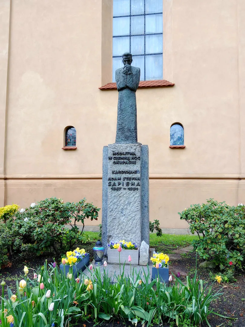 The figure above its stone base at Cardinal Adam Sapieha monument