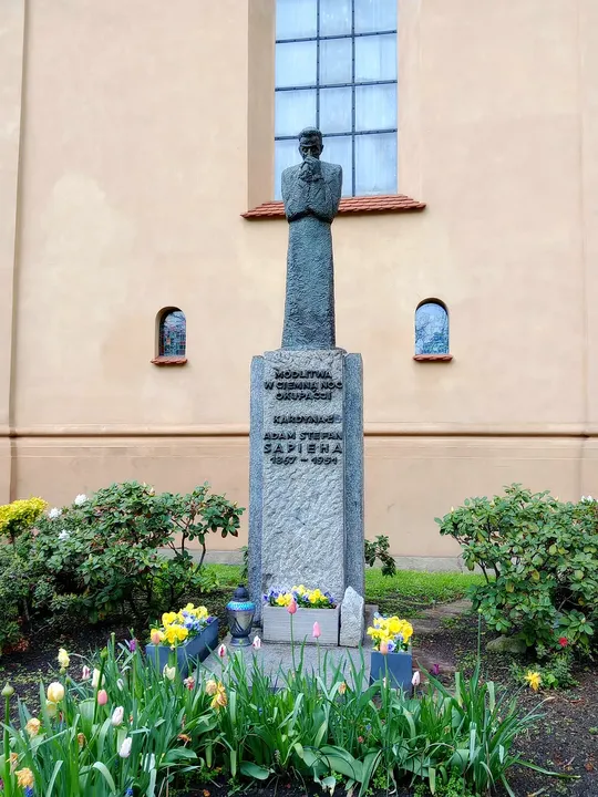 The figure above its stone base at Cardinal Adam Sapieha monument