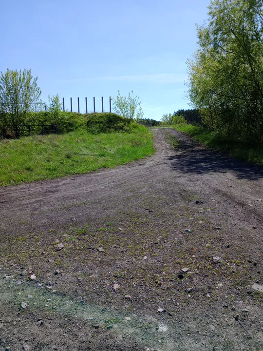 Open track beside the fields at Chemiczna–Łężyca cycling loop