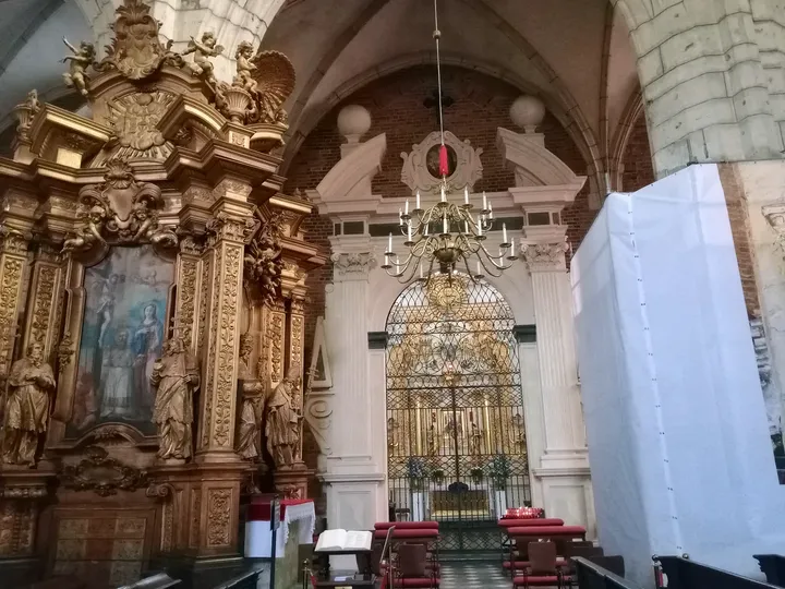 White and gilded side altar at Corpus Christi Basilica, Kraków