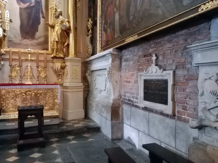 Paintings along the interior wall at Corpus Christi Basilica, Kraków