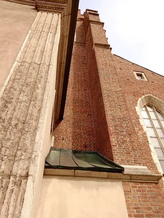 Buttress beside the church window at Corpus Christi Basilica, Kraków