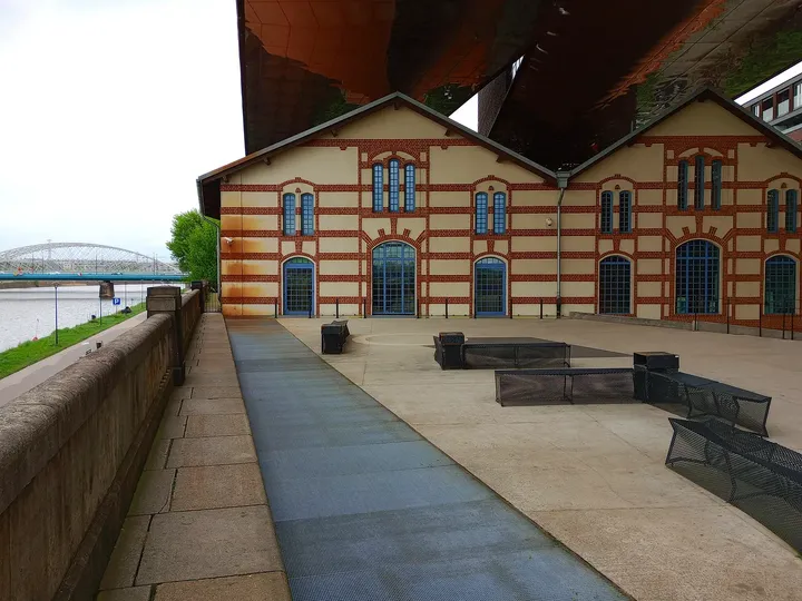 Older building beneath the elevated museum at Cricoteka
