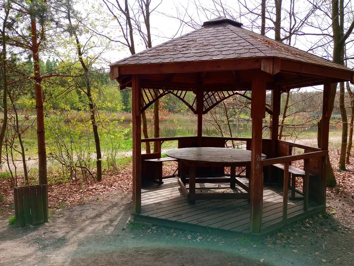 Timber picnic shelter near the bank at Czerwieńsk reservoir