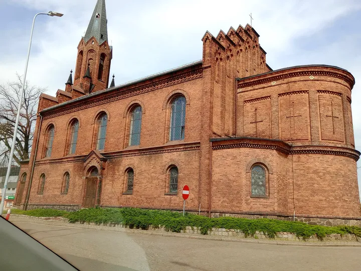 Rounded apse of the brick church at Czerwieńsk town walk