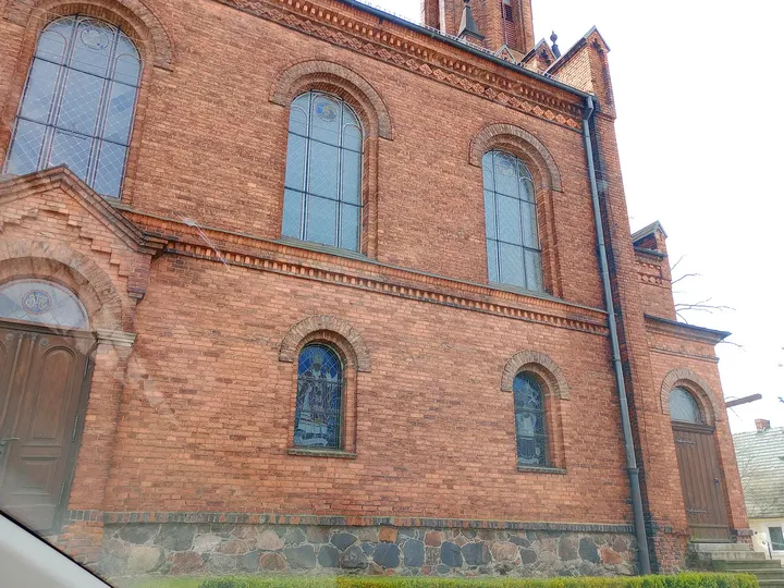 Side of the church beside the street at Czerwieńsk town walk