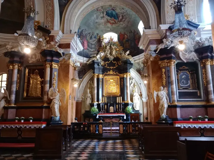 An altar beneath painted vaulting at Dominican monastery, Kraków