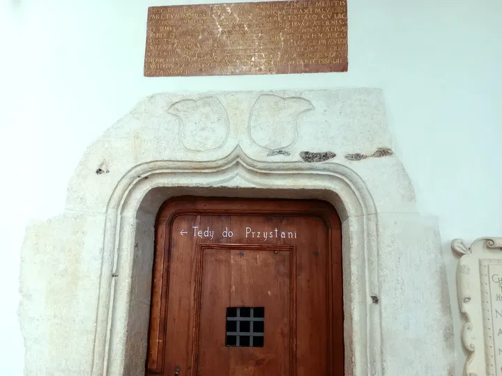 An old carved doorway surround at Dominican monastery, Kraków