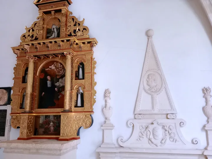 Carved wood beside an interior wall at Dominican monastery, Kraków