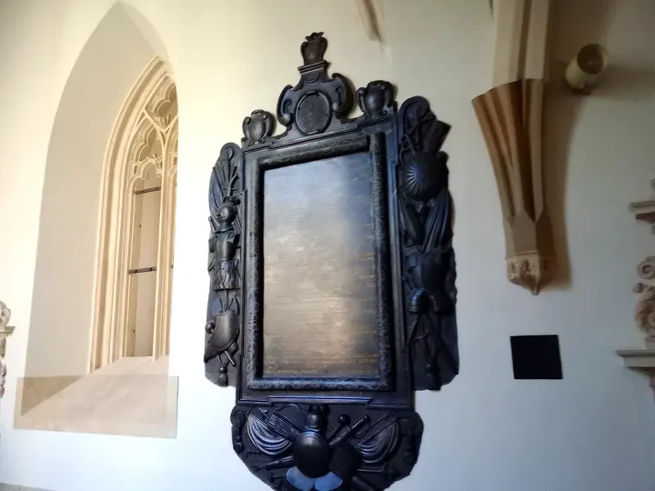 A framed memorial in the passage at Dominican monastery, Kraków