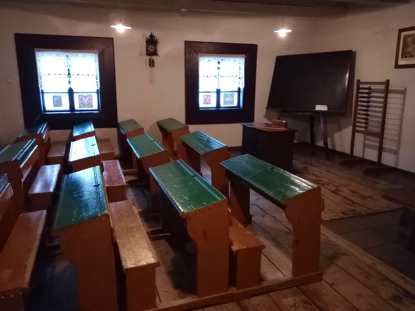 Benches and tables in a reconstructed interior at Ethnographic Museum, Kraków