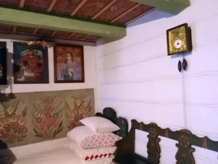 Furnished room with household objects at Ethnographic Museum, Kraków