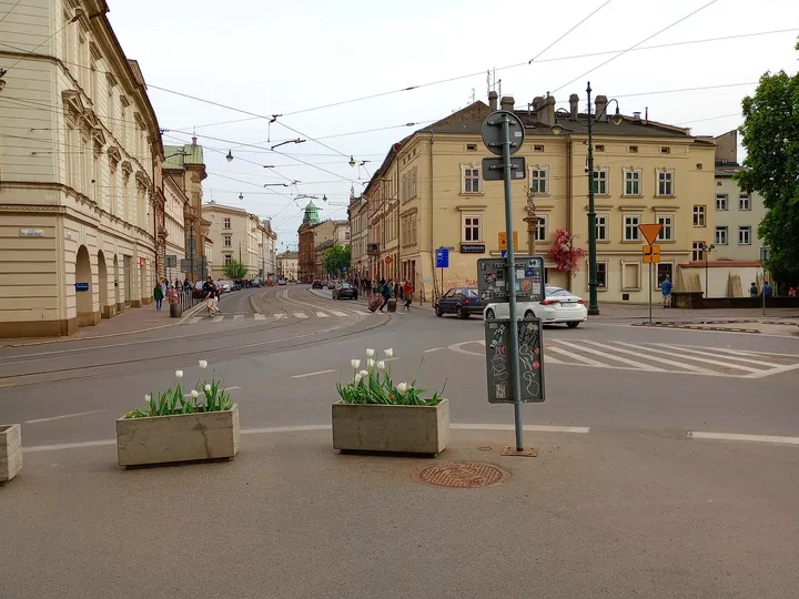 The paved square below Wawel at Father Adam Studziński Square