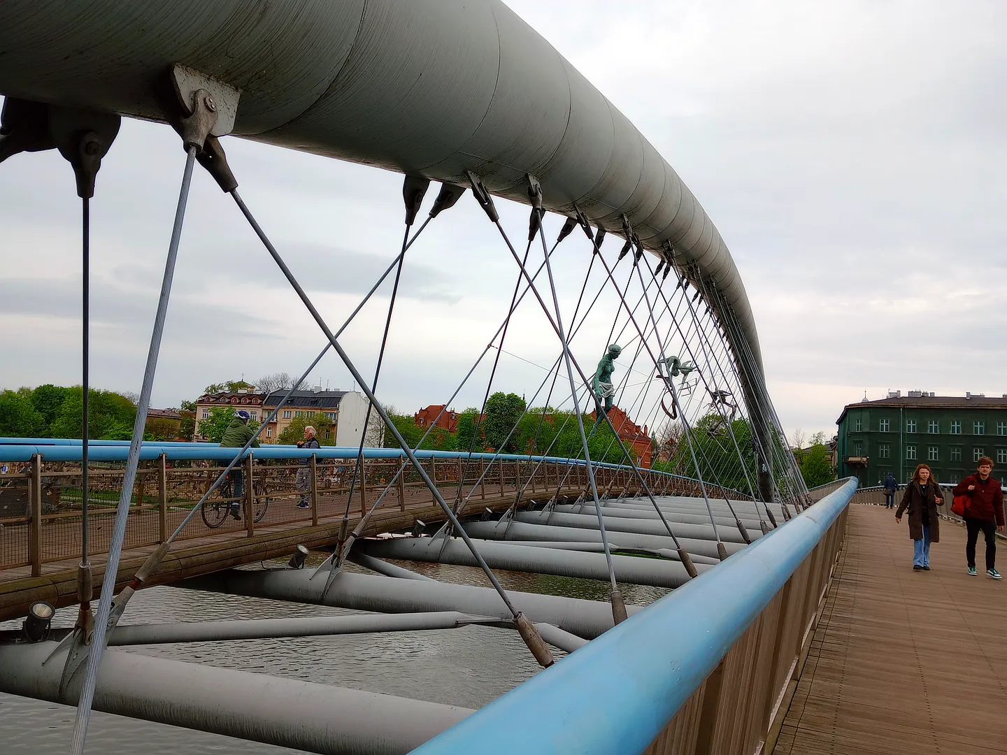 Suspension cables beneath the bridge arch at Father Bernatek Footbridge