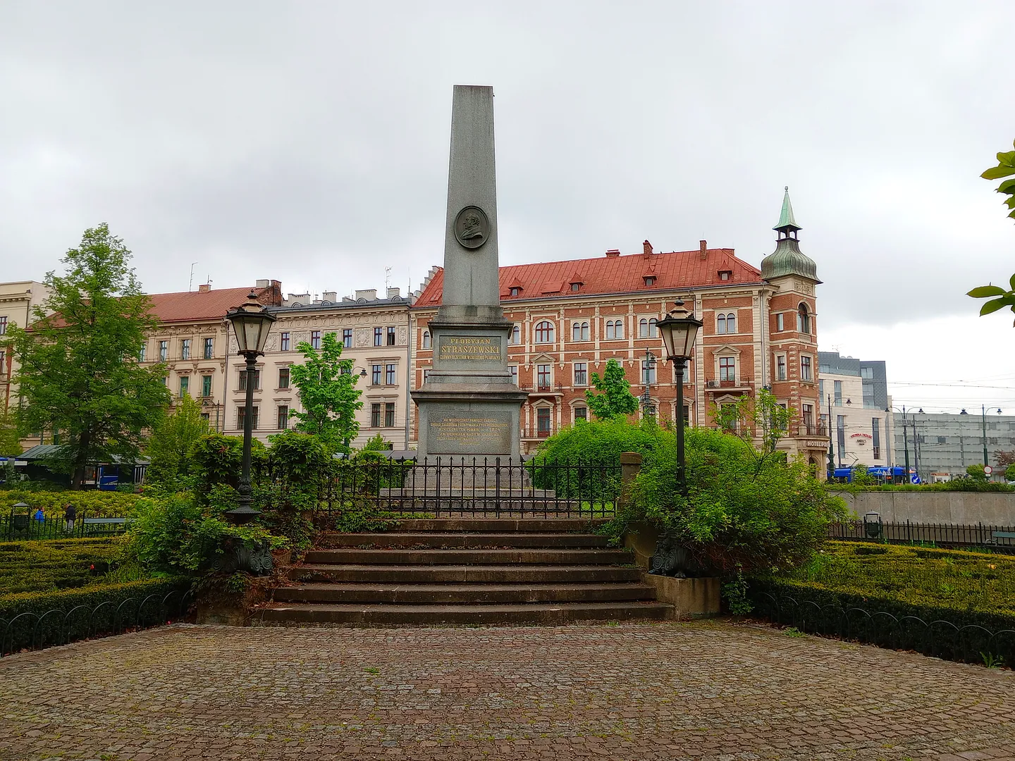 The obelisk above the planted steps at Florian Straszewski monument