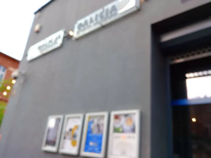 Posters beside the museum doorway at Galicia Jewish Museum