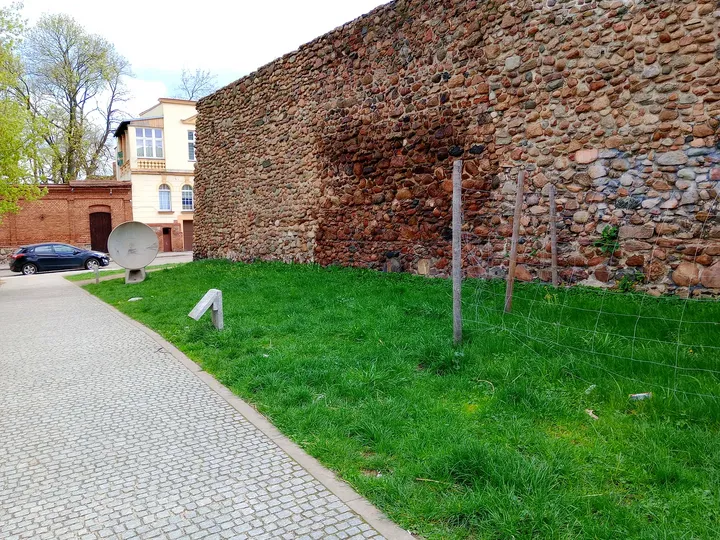 A path through the planted garden at General Maczek Square, Żagań