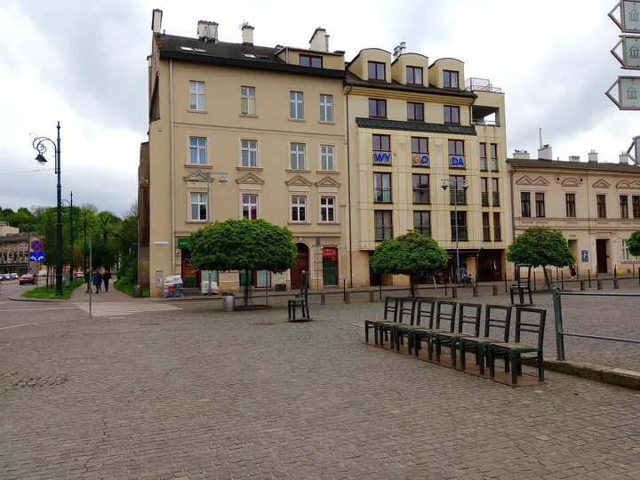 The chairs across the paved square at Ghetto Heroes Square