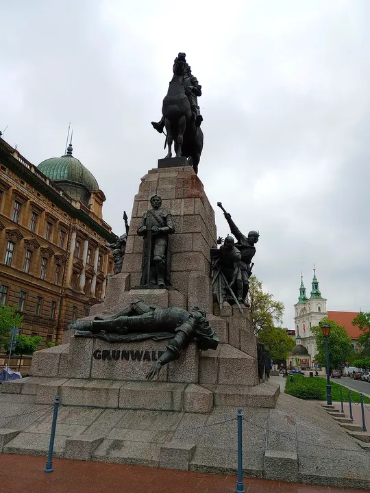 The mounted figure above the stone base at Grunwald Monument