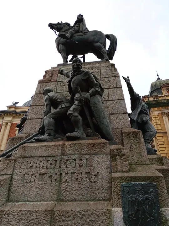 A close view of the lower reliefs at Grunwald Monument
