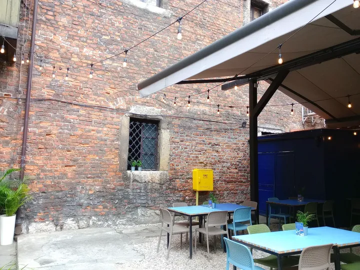 Sheltered outdoor seating at Hamsa