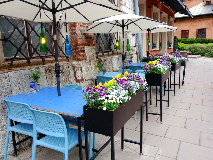 Tables and planting outside at Hamsa