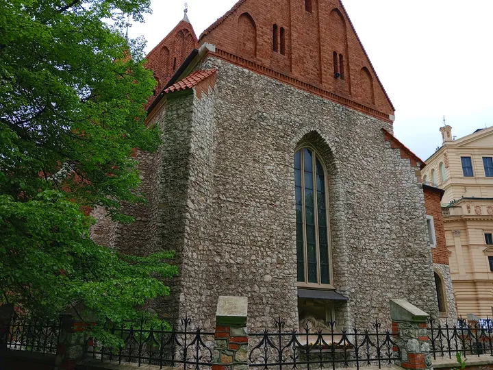 The church’s stone and brick exterior at Holy Cross Church, Kraków