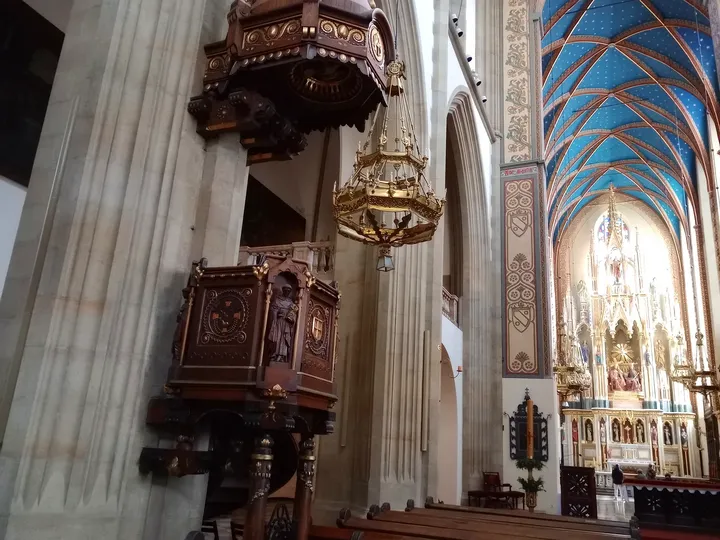 The pulpit beside the central nave at Holy Trinity Basilica, Kraków