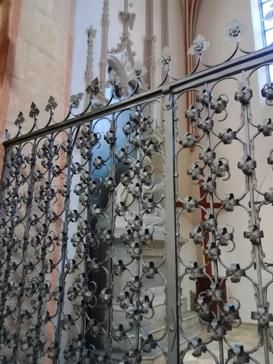 A decorative grille beside the aisle at Holy Trinity Basilica, Kraków