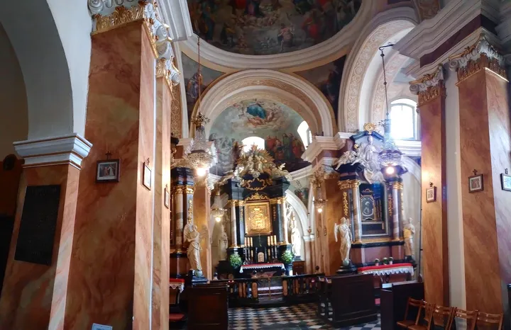 A chapel interior beside the nave at Holy Trinity Basilica, Kraków
