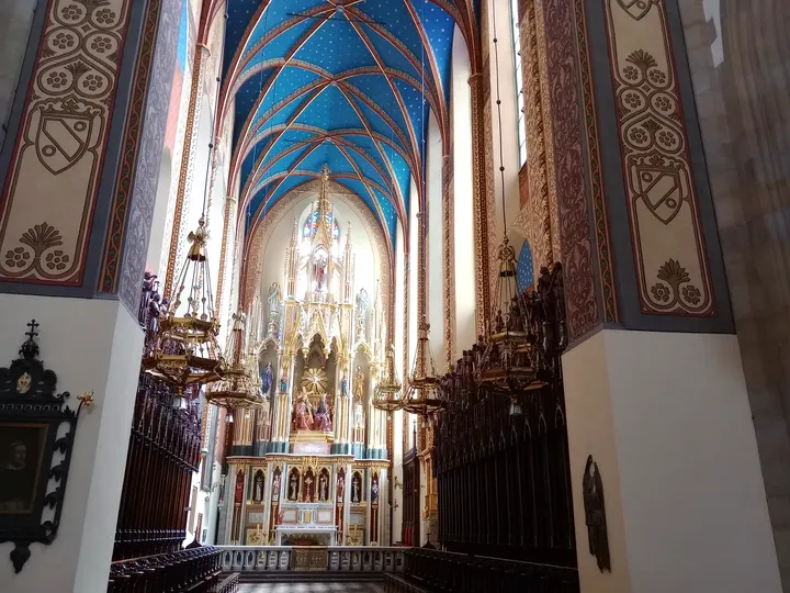 The central aisle towards the altar at Holy Trinity Basilica, Kraków