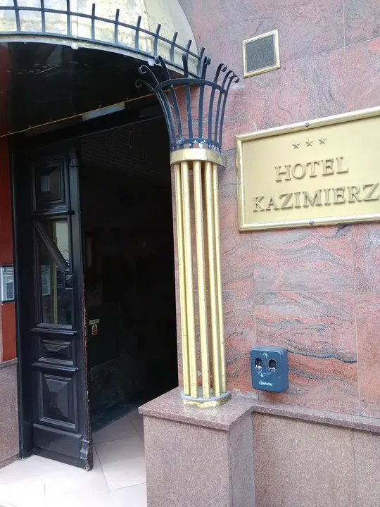 The doorway and hotel name plaque at Hotel Kazimierz