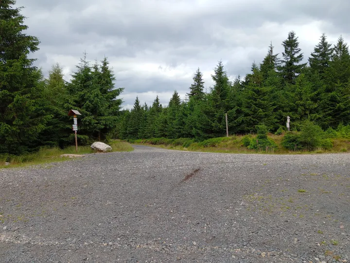 Open route junction beneath the sky at Izera Mountains cycling trail