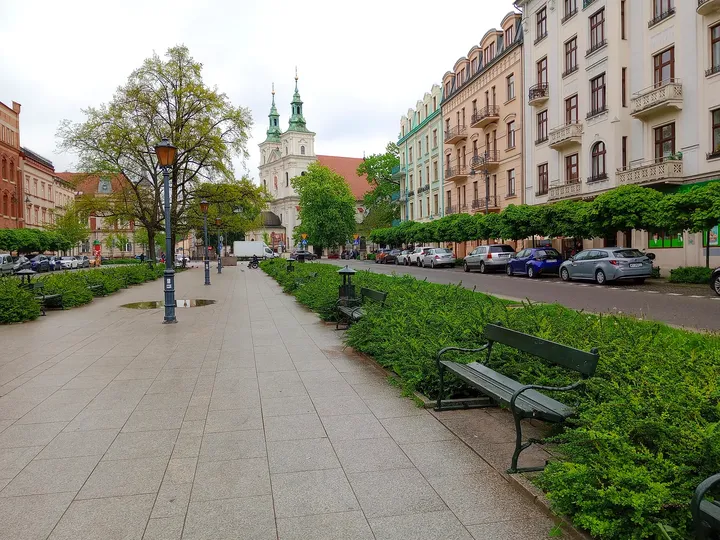 Benches beside the central planting at Jan Matejko Square