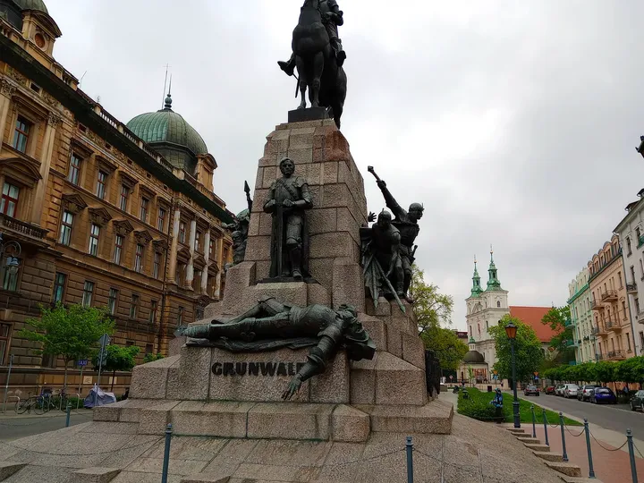 Mounted figure above the monument at Jan Matejko Square