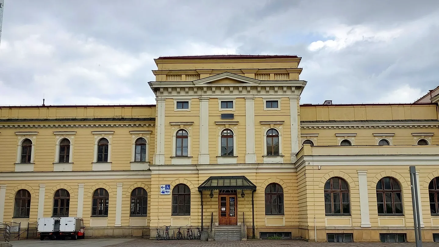 Long yellow frontage across the square at Jan Nowak-Jeziorański Square